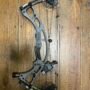 Hoyt Carbon RX-8 compound bow with Tombstone riser and KUIU camo limbs